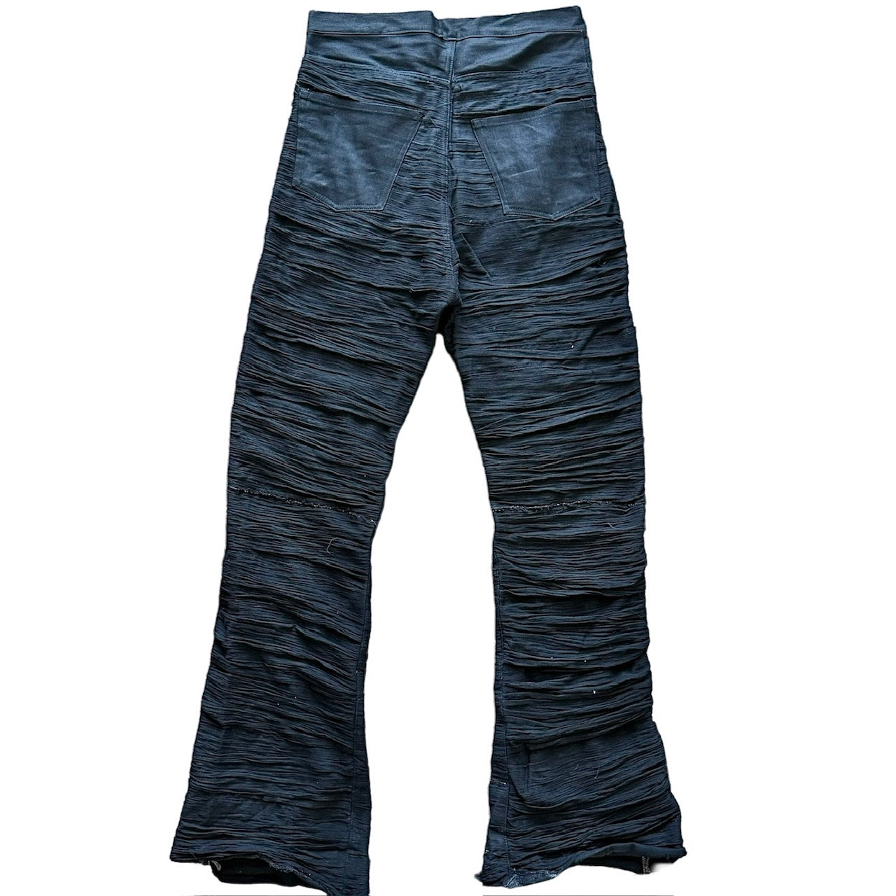 DISTRESSED PLEATED DENIM